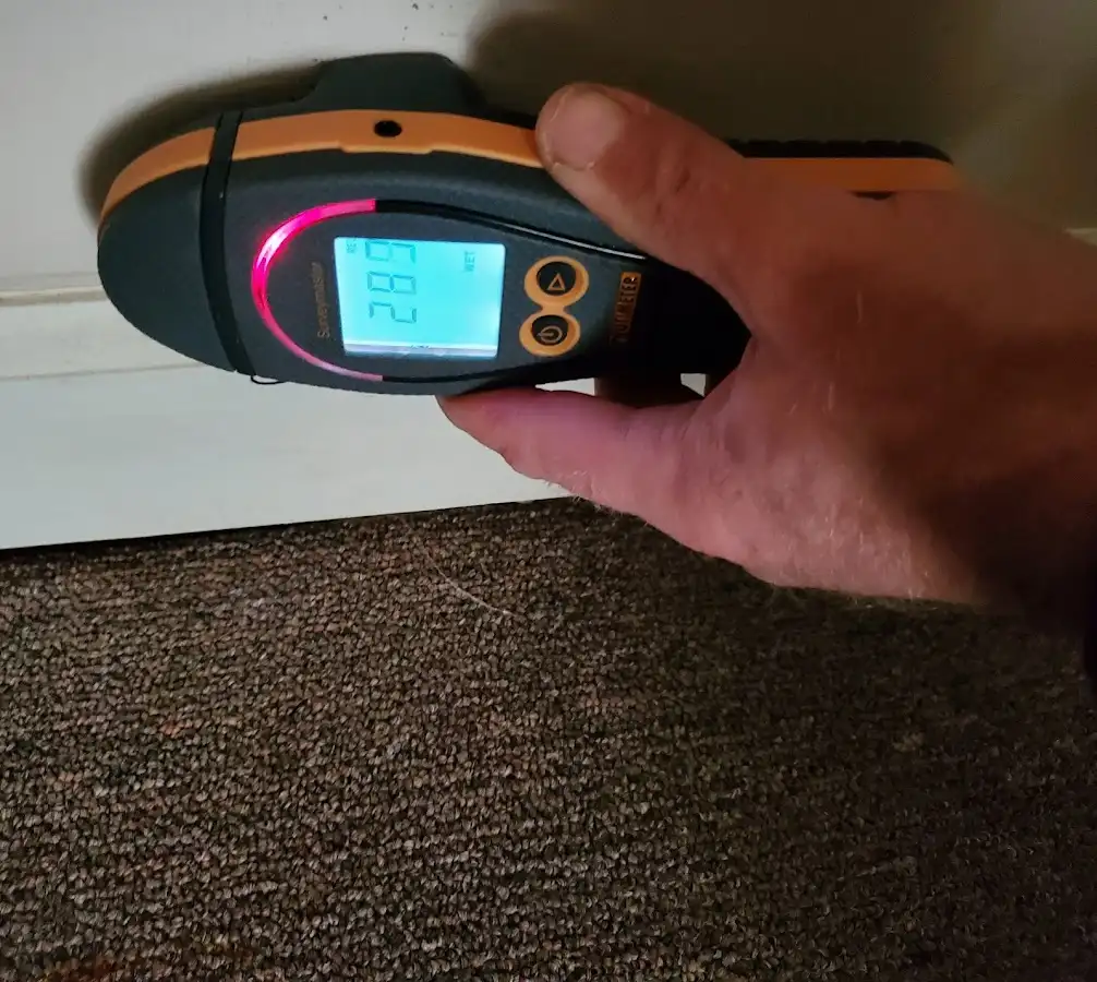 Moisture detection at baseboard during Burst Pipe Cleanup in Abilene